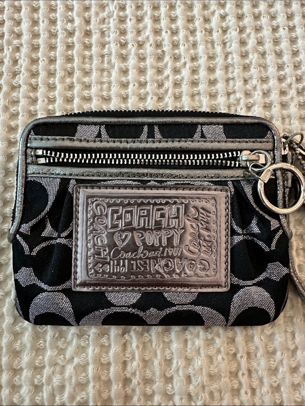 Y2K NWOT, never used.  Coach Poppy Signature Lurex Metallic Wristlet.
